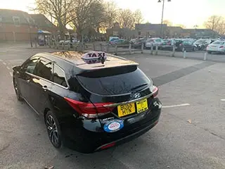 Hinton Cars professional taxi service vehicle in Ringwood, Hampshire
